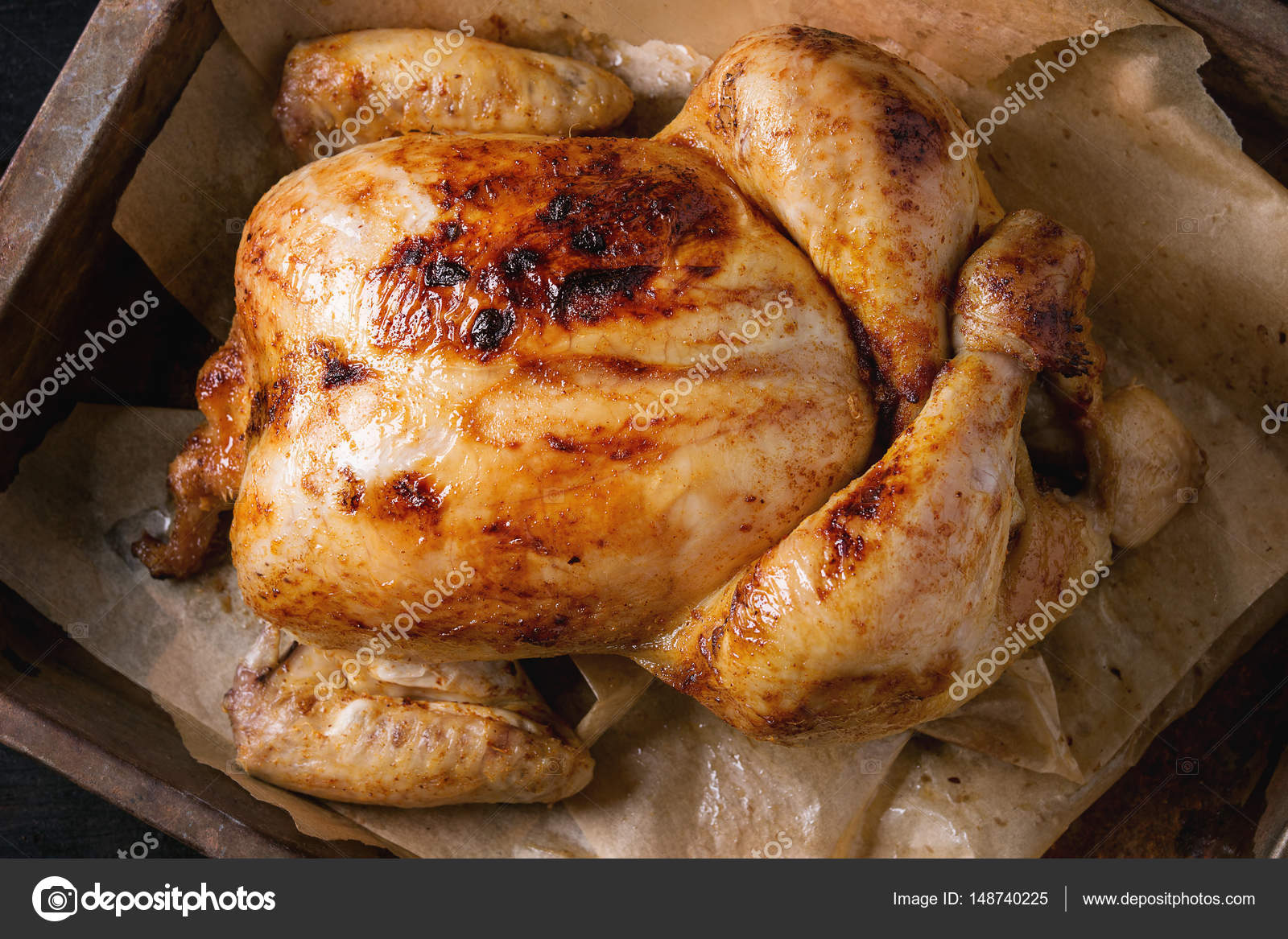 Grilled whole organic chicken Stock Photo by ©NatashaBreen 148740225