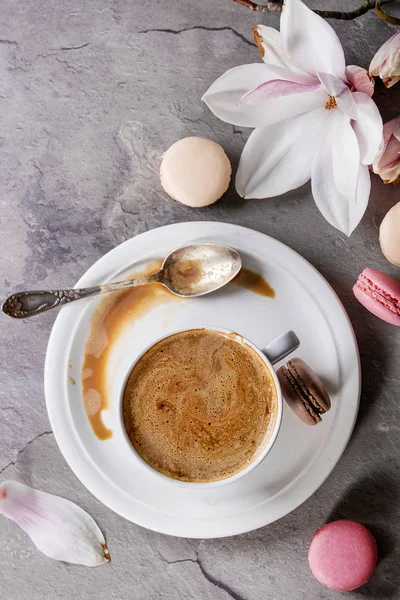 Cup of black coffee with magnolia — Stock Photo, Image