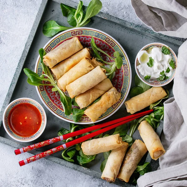 Fried spring rolls with sauce