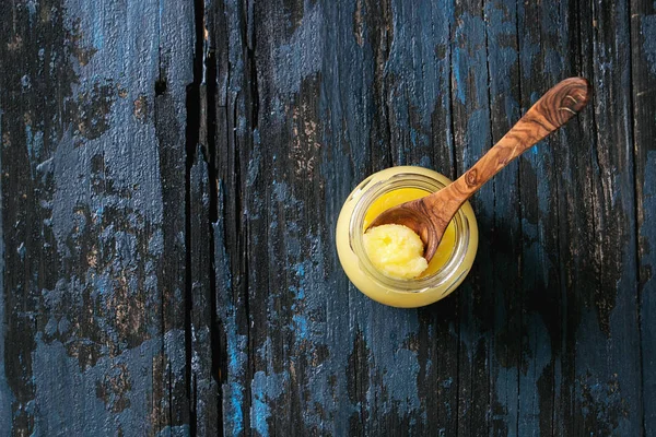 Glass of ghee butter — Stock Photo, Image