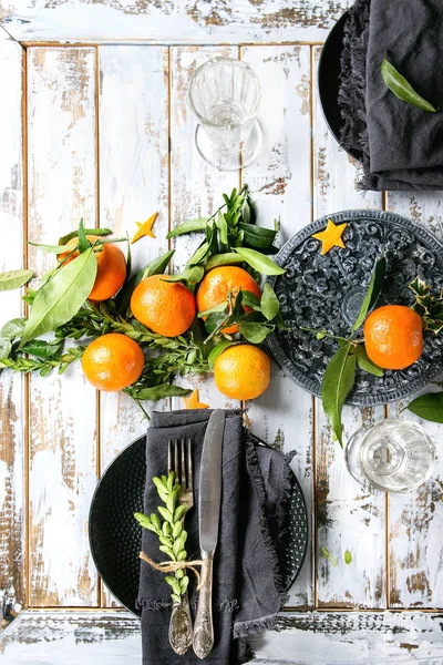 Weihnachtliche Tischdekoration mit Clementinen — Stockfoto