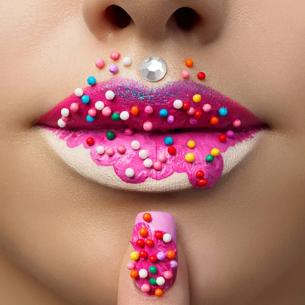 Close up view of female lips with sweet donut makeup — Stock Photo, Image