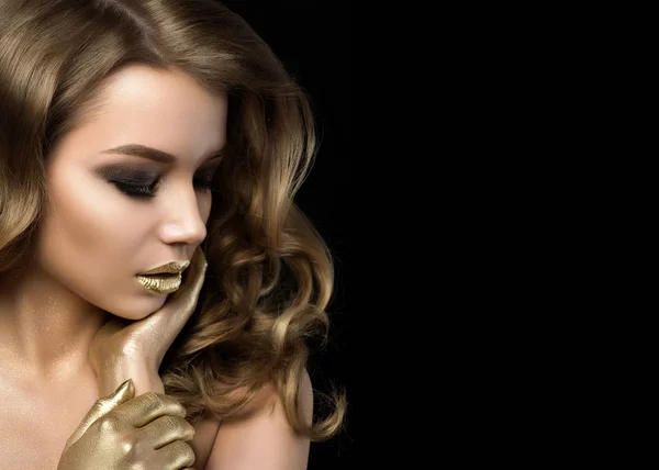Beauty portrait of young woman with golden makeup — Stock Photo, Image