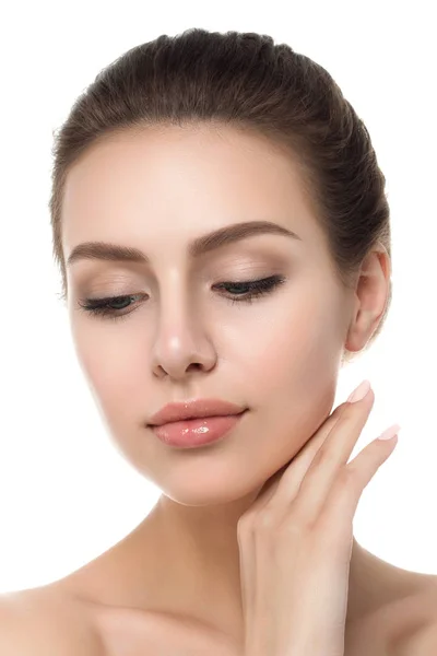 Portrait of young beautiful caucasian woman touching her face — Stock Photo, Image