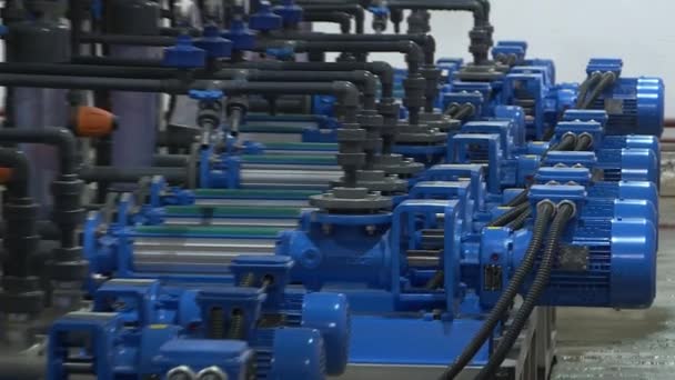 The engine room at the treatment facilities .Equipment inside the industrial premises . — Stock Video