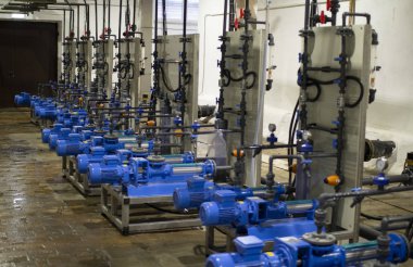 The engine room at the treatment facilities .Equipment inside the industrial premises .