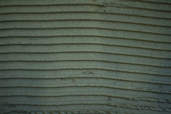 Textura da camada adesiva úmida.Estrutura da cola de construção . — Fotografia de Stock