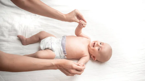 Mother Therapist Makes Massage Her Baby Home Health Care Medicine — Stock Photo, Image