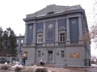 Russia, Novosibirsk, 01.01.1980: high gray historical building Museum art gallery architectural Institute