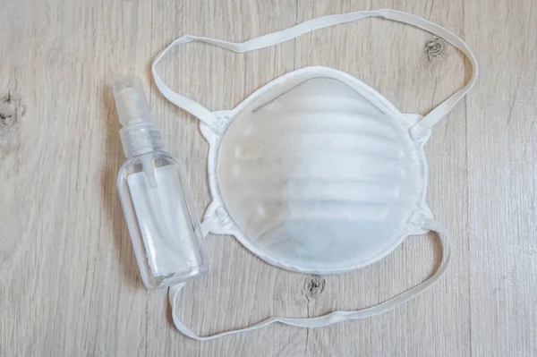 sanitizing kit. Medicine face mask and alcohol spray