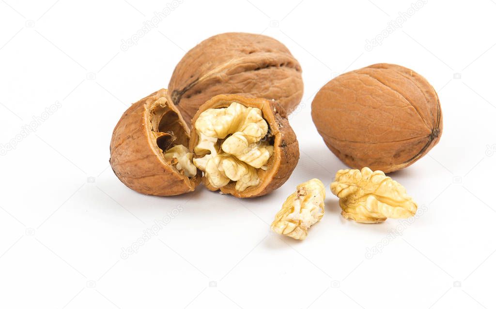 open walnuts closeup on white background