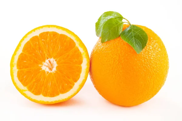 Fresh cut oranges with leaves — Stock Photo, Image