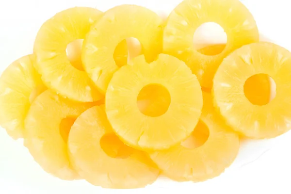 Pineapple slices closeup on white background — Stock Photo, Image