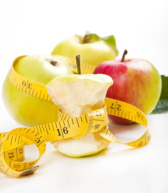 elma çekirdeği ve ölçüm bandı. Diyet kavramı