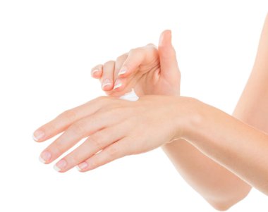 Güzel genç kadın el kremi, üzerinde beyaz izole