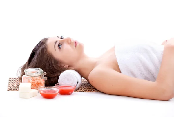 Girl with face mask on a stone therapy, hot stone massage — Stock Photo, Image