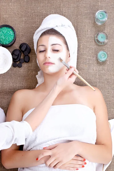 Mask, massage of face for woman in spa salon — Stock Photo, Image