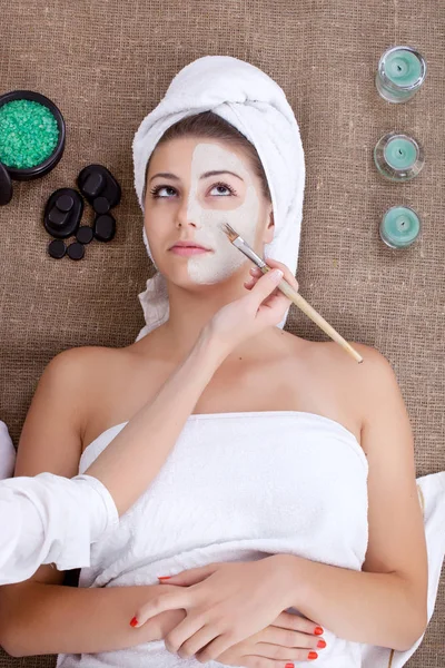 Mask, massage of face for woman in spa salon — Stock Photo, Image