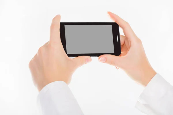 Female hand is holding a modern touch screen phone. Screen is cu — Stock Photo, Image