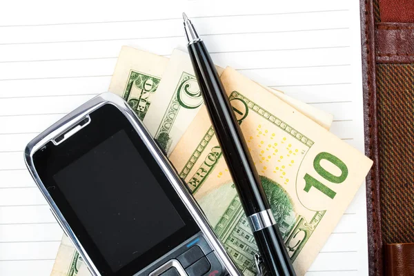 Accounting. cash money, pen and mobile phone on table. — Stock Photo, Image