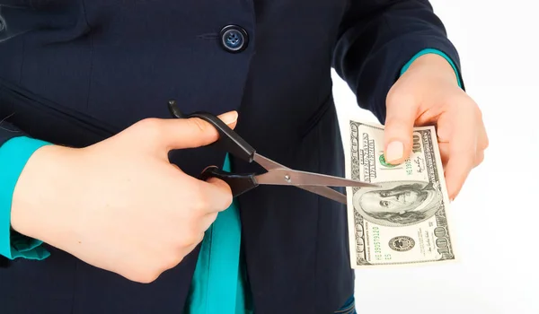 Business woman hands with scissors cutting money isolated on whi — Stock Photo, Image