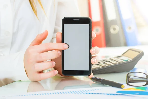 Business woman show gadget phone in office — Stock Photo, Image