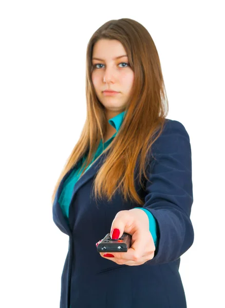 Young business woman and remote control panel TV Royalty Free Stock Images