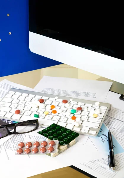 Doctor Workplace Pills Glasses Keyboard Patient History Database — Stock Photo, Image