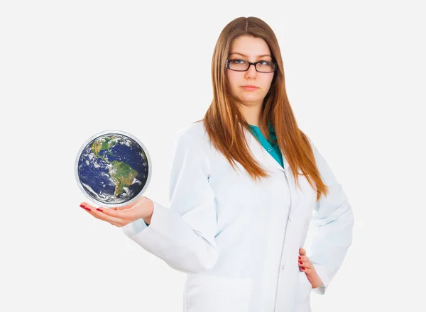 young female doctor showing earth globe on hand