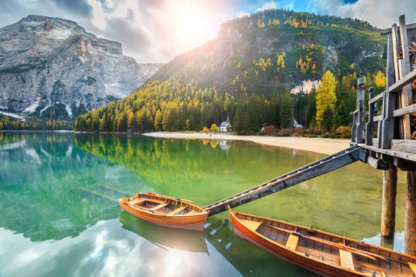 Wooden boats on the alpine lake, Dolomites, Italy, Europe — Stockfoto