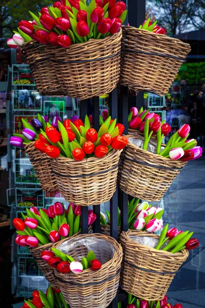 Colorful bright wooden tulips and postcards on the stand, Netherlands — Stock Photo, Image