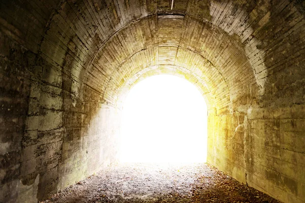 Tunnel with light coming from the exit. — Stock Photo, Image