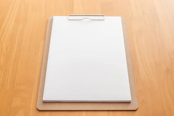 Wooden clipboard on wood background — Stock Photo, Image