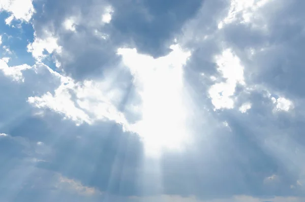 Sun ray light through down from cloud — Stock Photo, Image