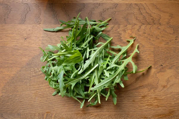 Rucola Stabilire Masă Flatlay Împușcat Sus Masă Bucătărie Maro — Fotografie, imagine de stoc