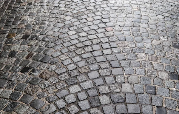 Detailed close up on old cobblestone roads in urban areas and old towns
