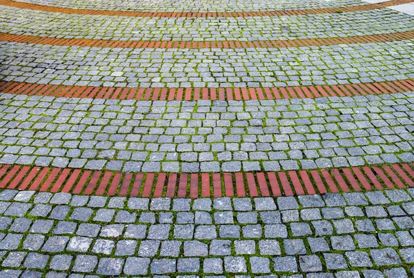 Detailed close up on old cobblestone roads in urban areas and old towns