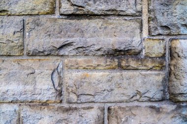 Güzel, eski tuğla duvar, farklı renklerde, yakın çekim manzaralı.