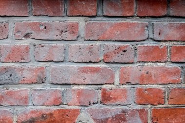 Kırmızı tuğla duvar. Eski yıpranmış kırmızı tuğla duvar panoramik zemin.