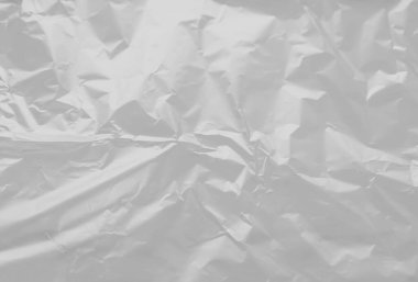 Beyaz arkaplanda boş bir plastik film dokusunun güzel yakın plan görüntüsü