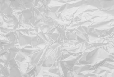 Beyaz arkaplanda boş bir plastik film dokusunun güzel yakın plan görüntüsü