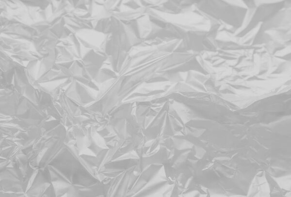Красивый вид вблизи на пустую текстуру пластиковой пленки на белом фоне
