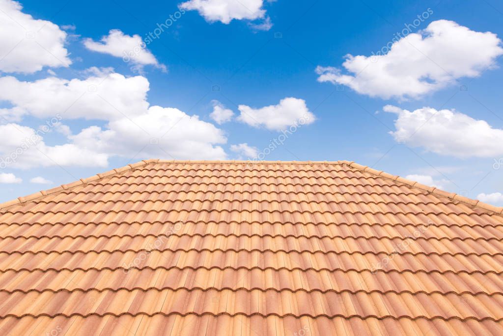Roof tiles and sky sunlight. Roofing Contractors concept Install