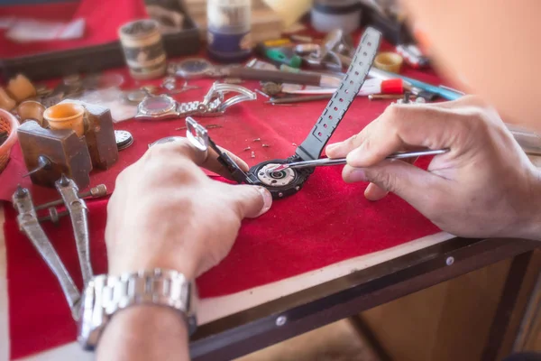 Process of installing a part on a mechanical watch, watch repair