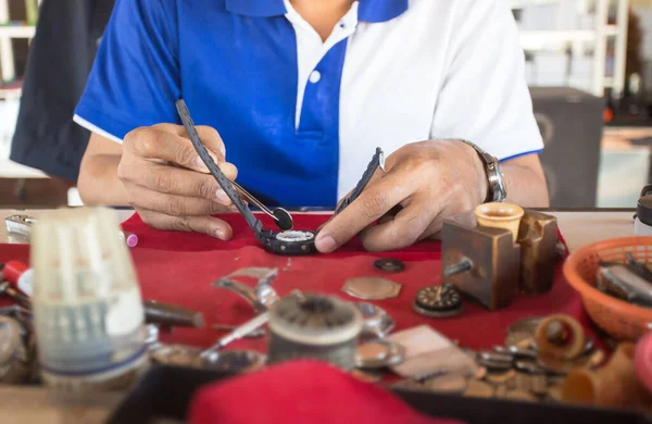 Process of installing a part on a mechanical watch, watch repair