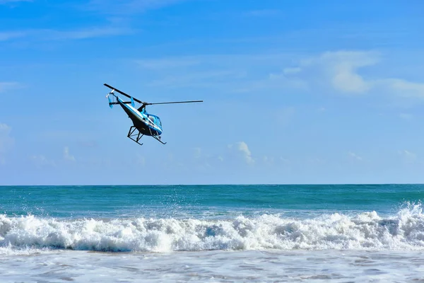 Macao beach. Dominican Republic October 7, 2015. An excursion helicopter takes off over the beautiful Caribbean coast — Stock Photo, Image