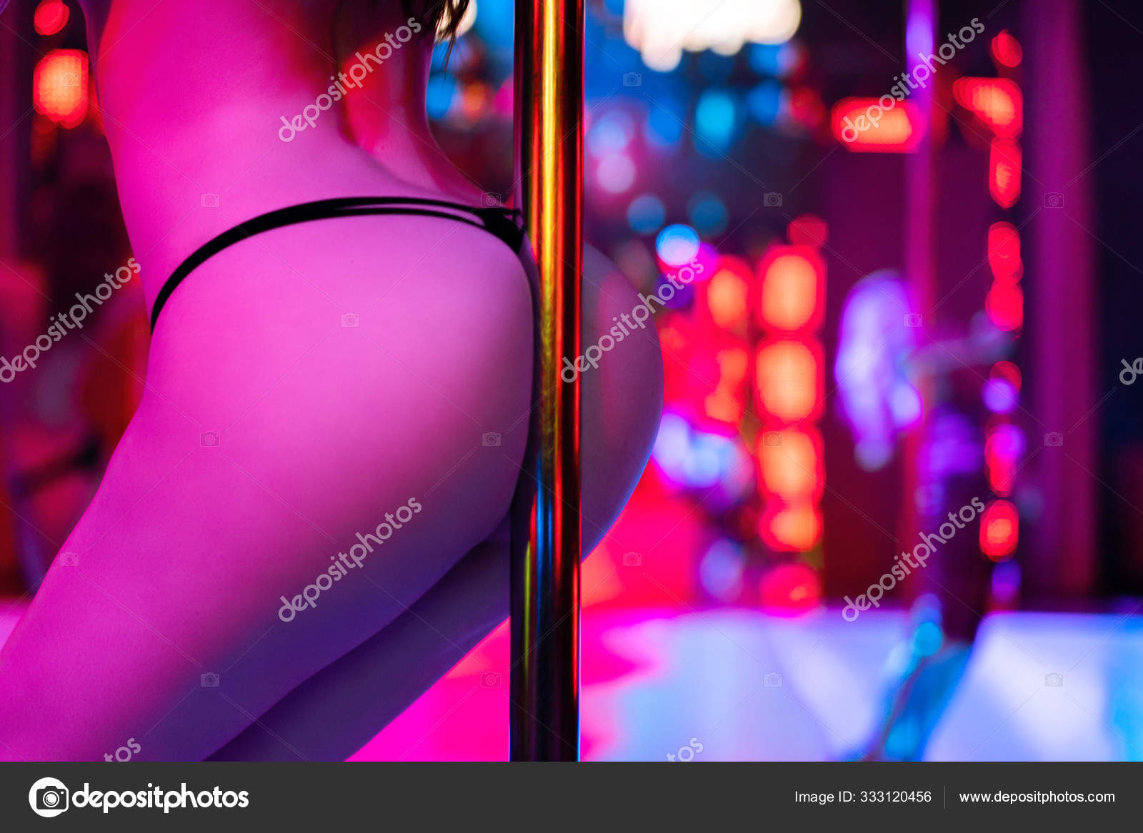 Girl in all black club pole dance