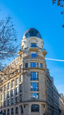 Paris, typical facade and windows, narrow building rue Reaumur