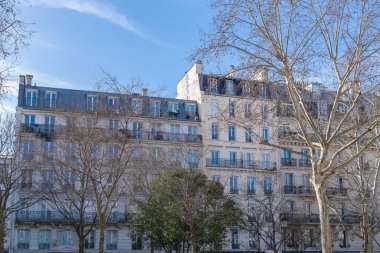 Paris, typical facades and windows, beautiful buildings in Montmartre