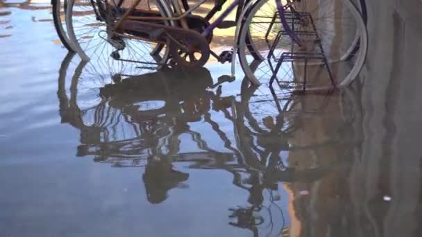 Bicycles parked in the city flooded by the tsunami — Stock Video